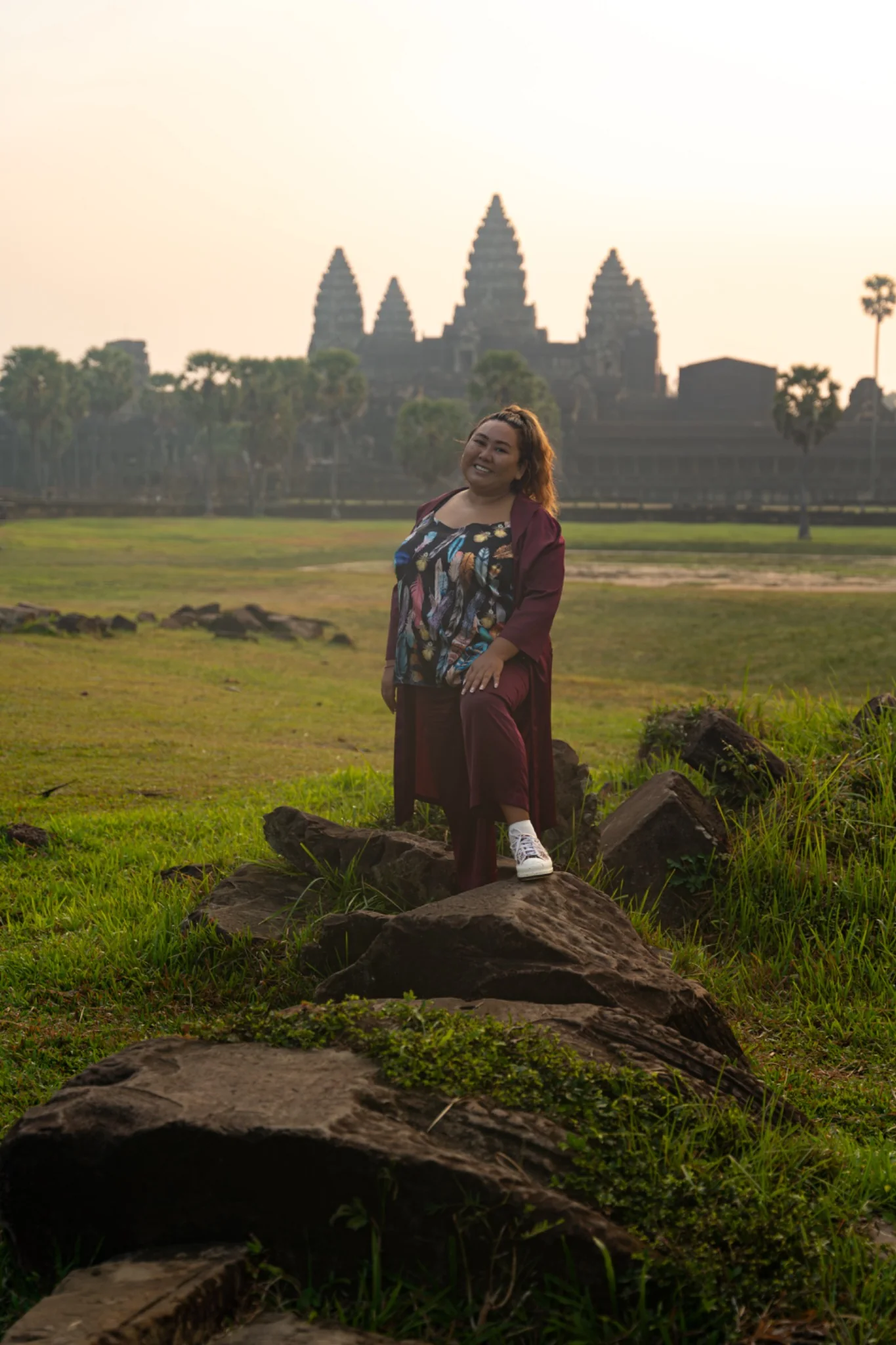 Altynai Kapalbaeva visiting a sacred site in Cambodia