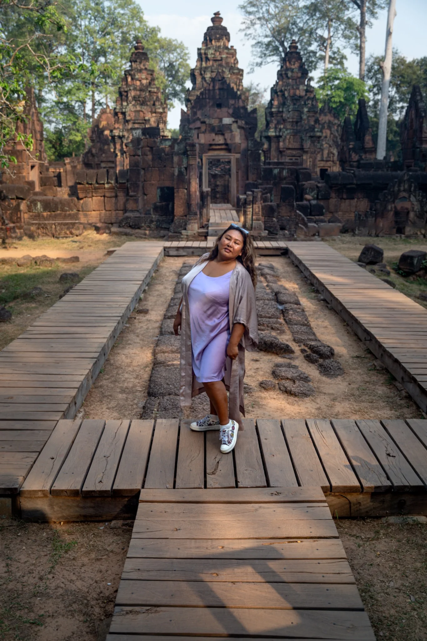Altynai Kapalbaeva visiting a sacred site in Cambodia